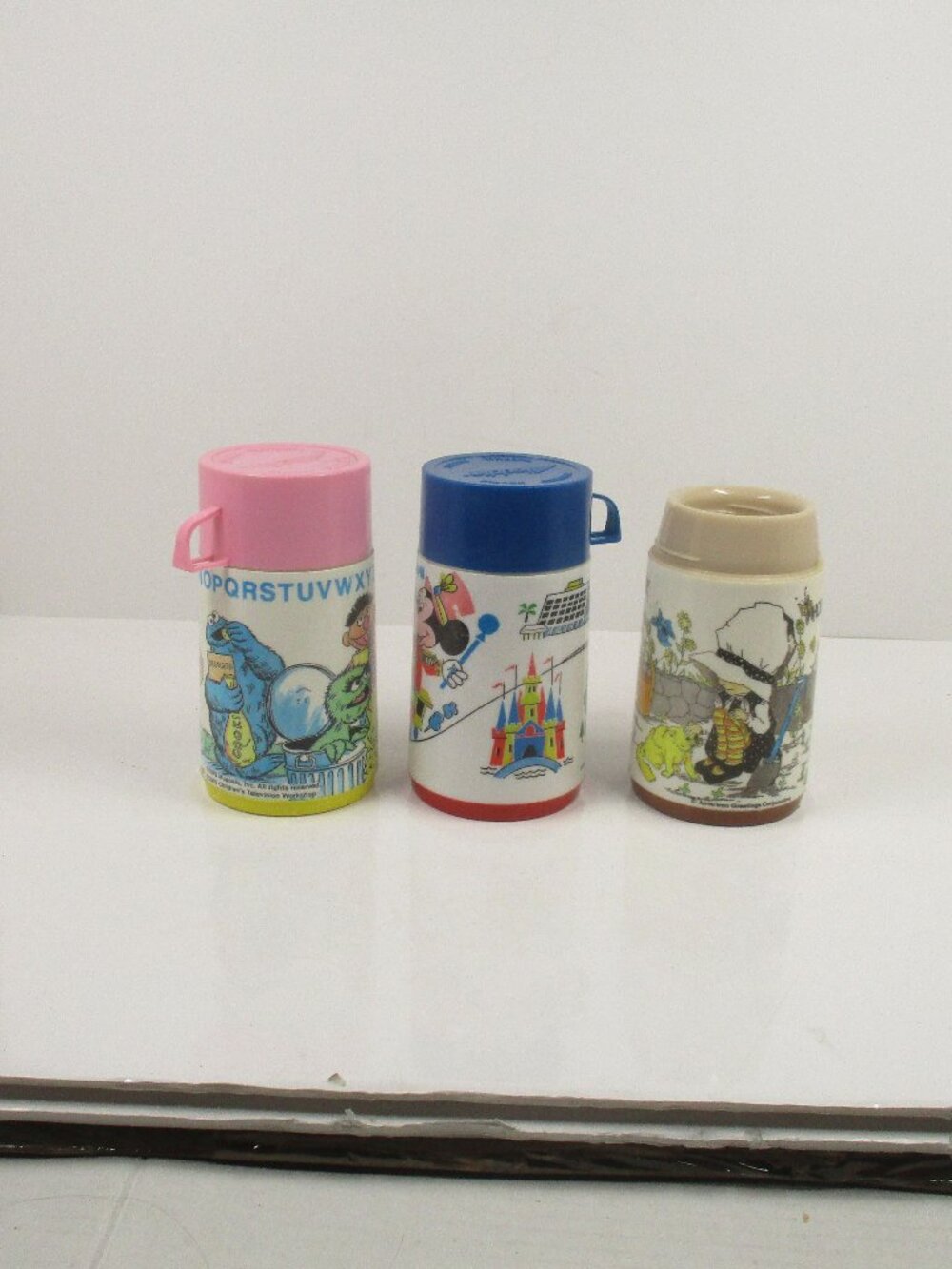 3 Vintage 1970s Kids Thermos Lot Sesame Street, Walt Disney World & Holly Hobbie